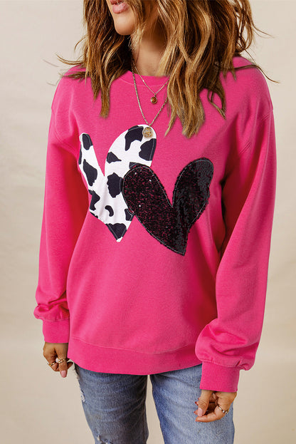 Pink cow print sweater