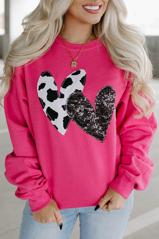 Pink cow print sweater
