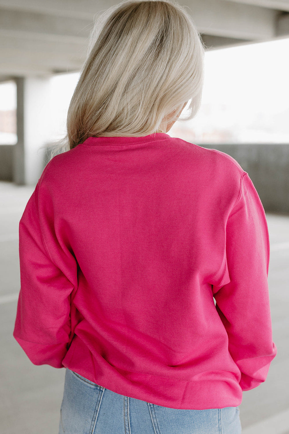 Pink cow print sweater